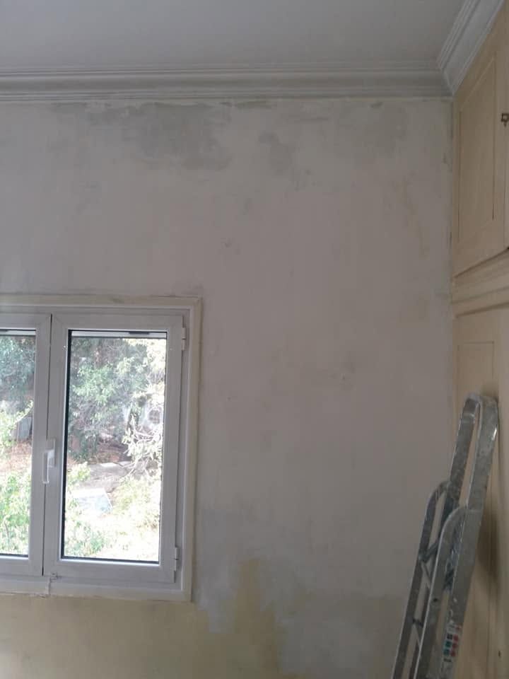 The wall scraped and filled