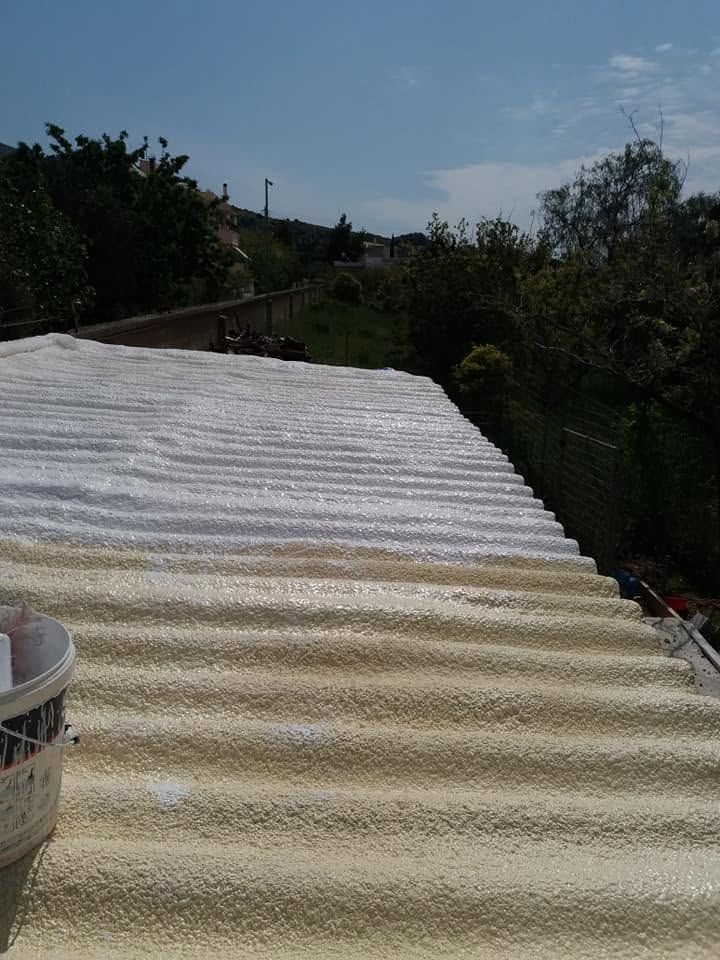 The foamed roof with the white coat starting on top
