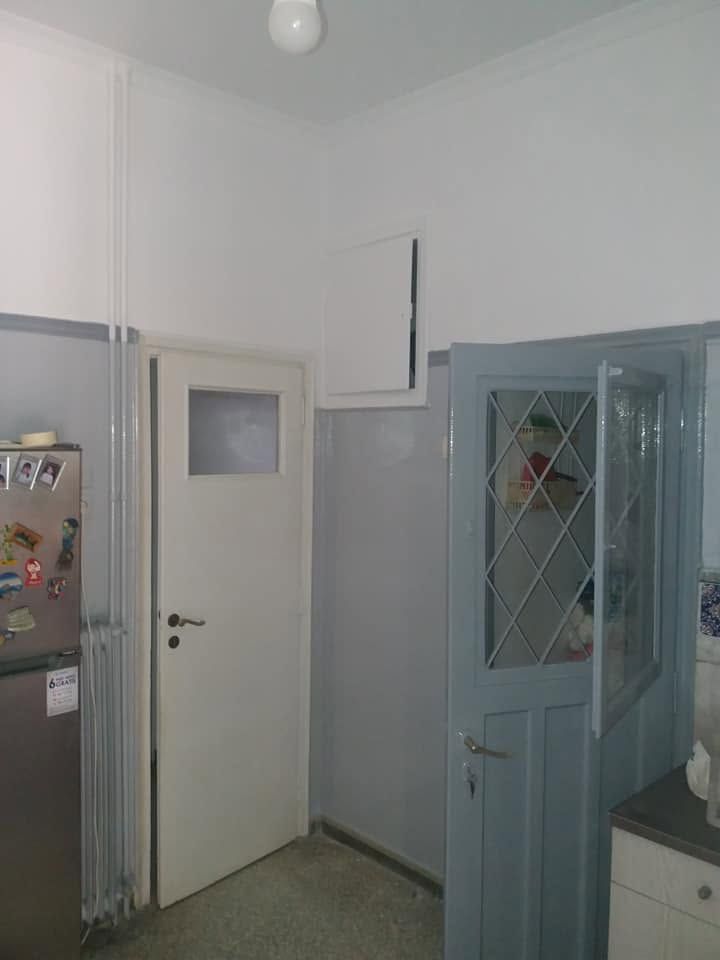 Kitchen Repainted in Grey and White - After