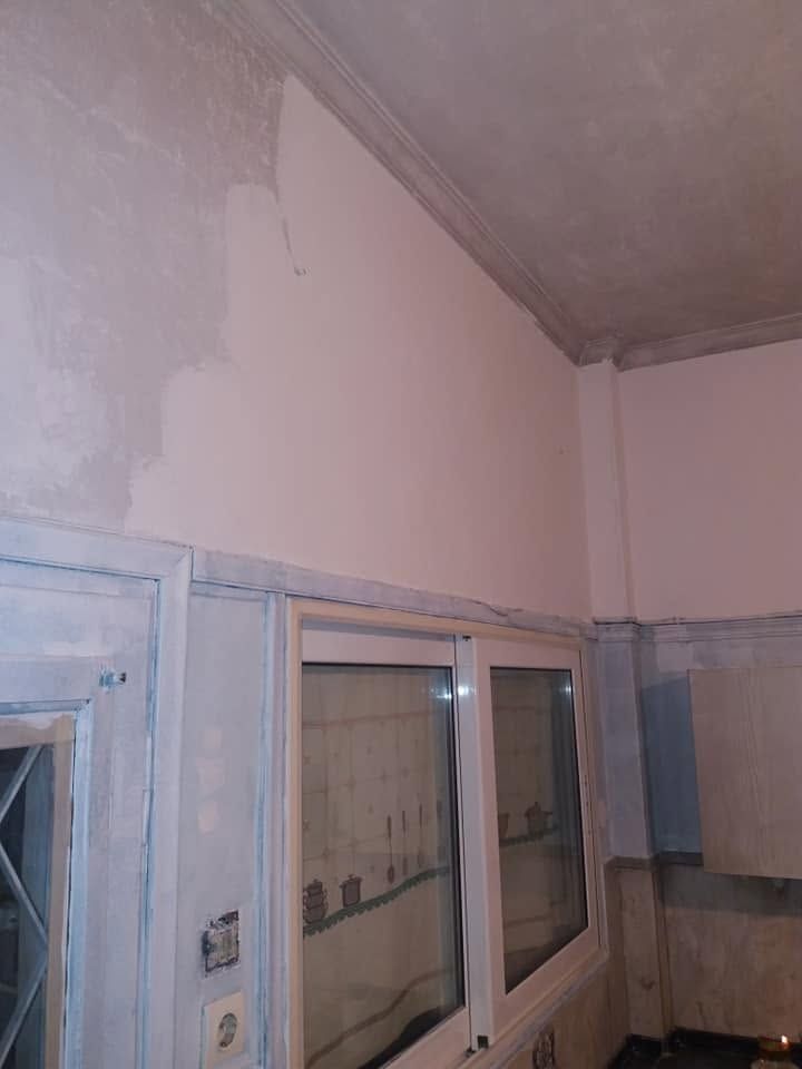 Filled walls above the windows
