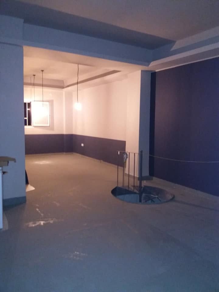 The painted space with the lights on