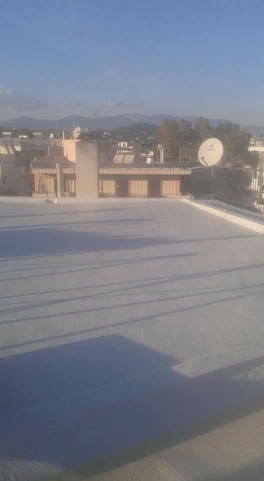 عزل سطح مبلّط برغوة البولي يوريثان المرشوشة
